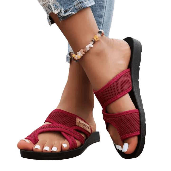 Celia | Gleitsandalen aus perforiertem Mesh